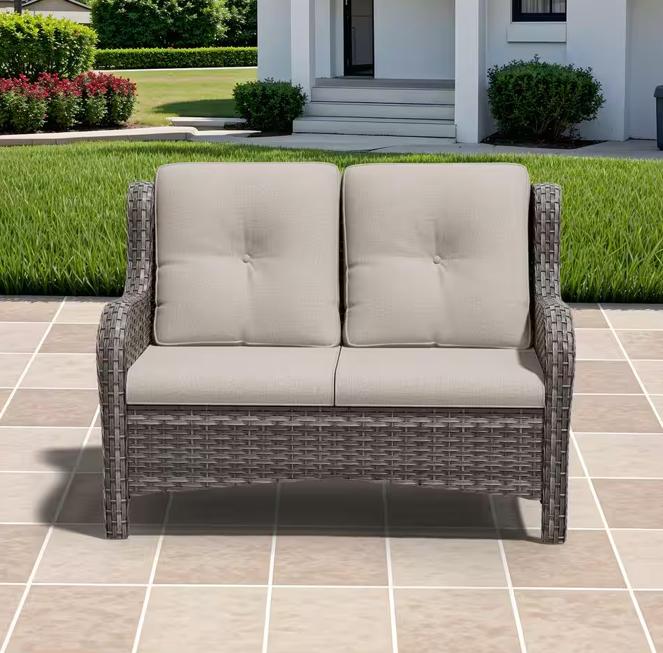 Brown Wicker Outdoor Patio Loveseat with Beige Cushions